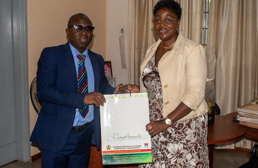 Ag DG, NISLT Presents Soveneer to the VC, Dominican University